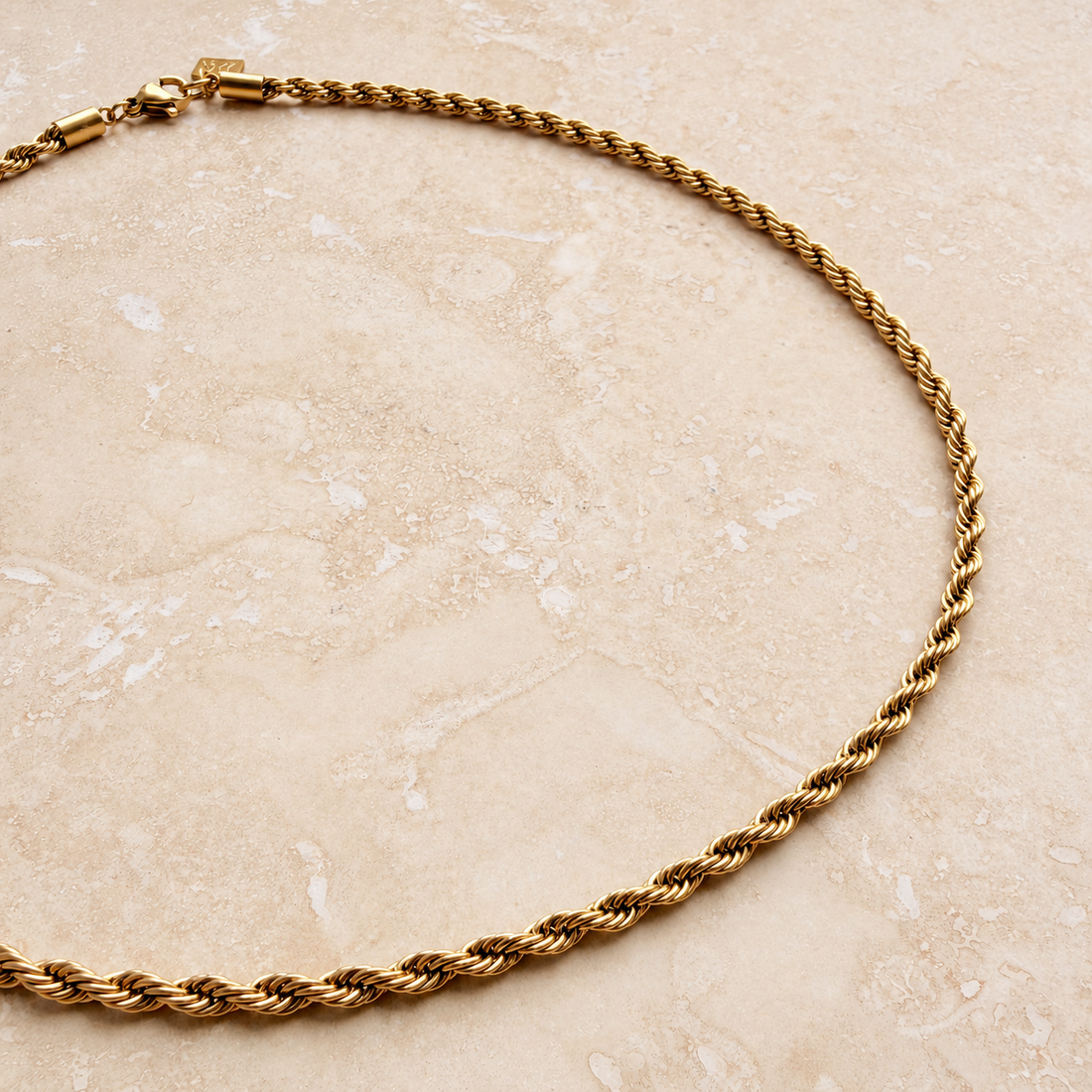 Close up of the Everyday Rope Twist Choker in gold, showing the twisted rope links
