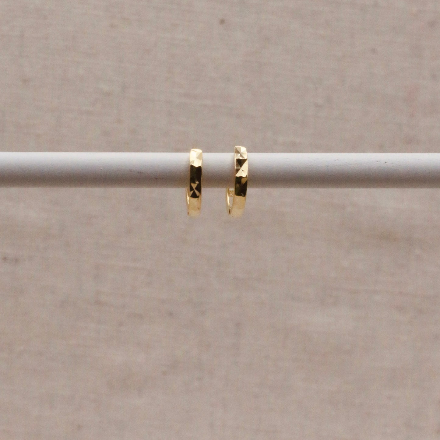 Load image into Gallery viewer, Gold Faceted Huggie Hoops
